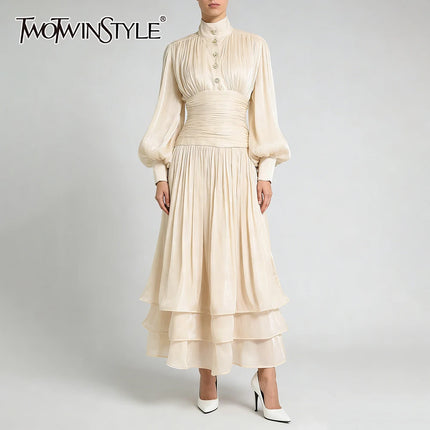TWOTWINSTYLE Solid Spliced Metal Buttons Temperament Long Dresses for Women High Neck Long Sleeves Patchwork Folds Dress Female