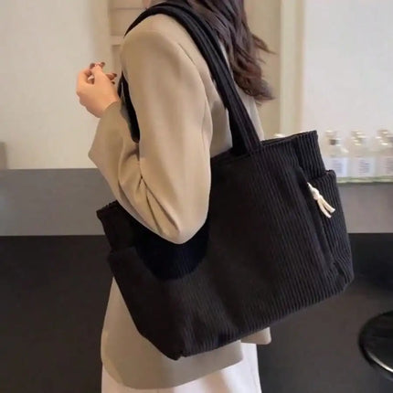 A stylish new tote bag for women—crafted from soft, comfortable corduroy fabric, making it the ideal choice for daily commuting.