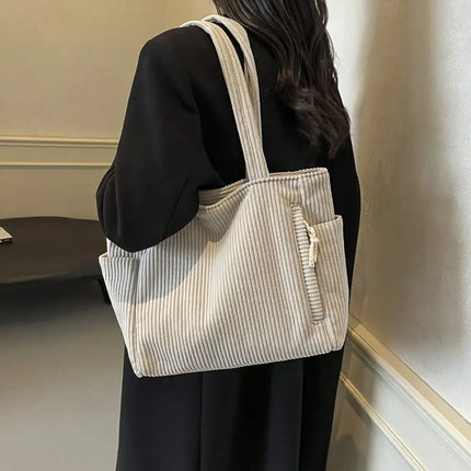 A stylish new tote bag for women—crafted from soft, comfortable corduroy fabric, making it the ideal choice for daily commuting.