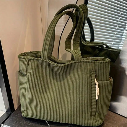 A stylish new tote bag for women—crafted from soft, comfortable corduroy fabric, making it the ideal choice for daily commuting.