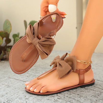 Clip Toe Bowknot T-Strap Roman Sandals Women Summer 2026 Soft Sole Elastic Back Flat Sandals Ladies Lightweight Vacation Shoes