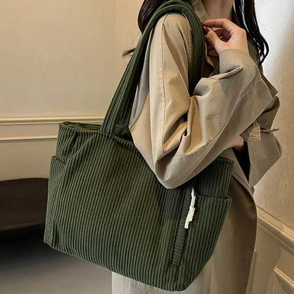 A stylish new tote bag for women—crafted from soft, comfortable corduroy fabric, making it the ideal choice for daily commuting.