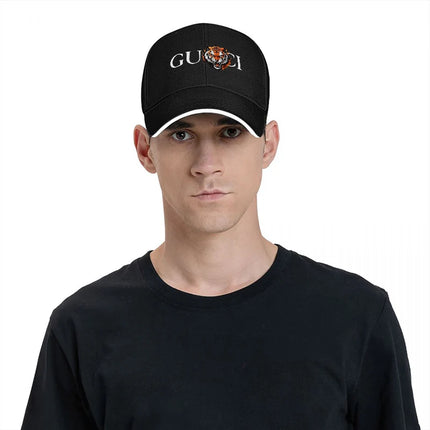 GUCCI TIGER LOGO BLACK BASEBALL CAP CLASSIC DESIGN WITH BOLD EMBROIDERY AND STRIKING ANIMAL MOTIF FOR A FASHION FORWARD LOOK